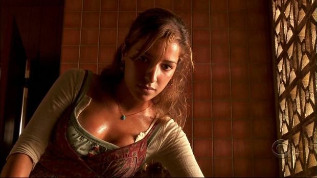 Beautiful babe with a lovely face and sweaty chest
