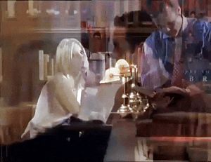 Buffy teases Xander by biting her lips while ignoring Giles completely!