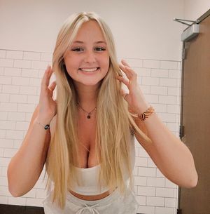 Anya big boobs hands in hair