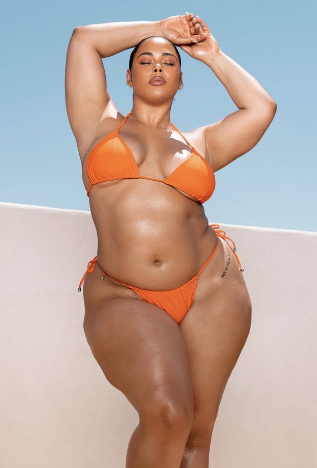 Tabria posing in her Orange bikini