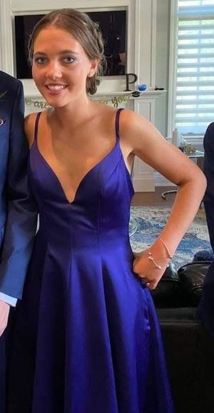 Hannah in prom dress inside