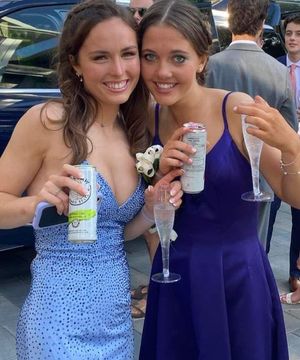 Hannah and friend drinks in hand