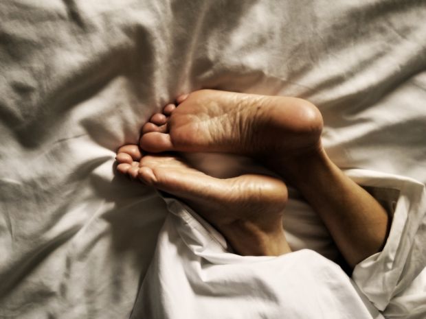 Wife's bare soles.