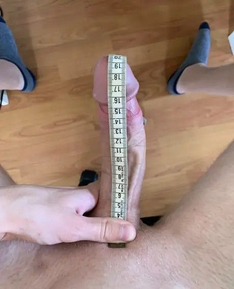 My brother measures his big cock. 20cm.