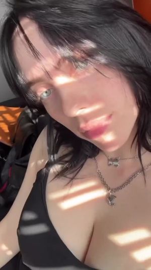 Which is better? The sunlight or her boobs?