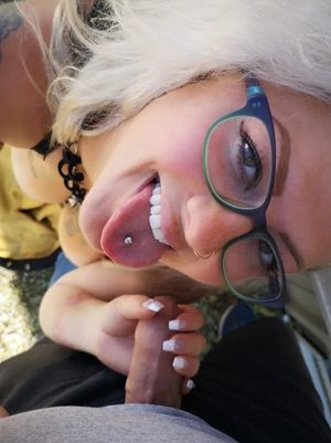 Amateur blond with glasses sucking an uncircumcised dick