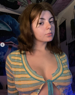 Sophie Dunn flaunting her big natural tits for you to do with as you so please.