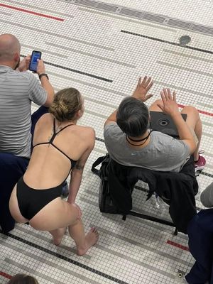 College Diver Bending Over