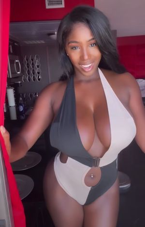 Ellie Mae huge boobs one-piece red curtain