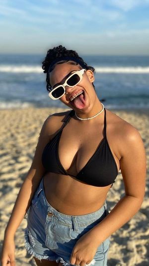 Teen Latina Bikini Busty Tongue Out Braces Smile