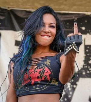 Oh, yeah! Sexy Diamond Head Metal Bitch. Oh and of course.. SLAYER!! };>~