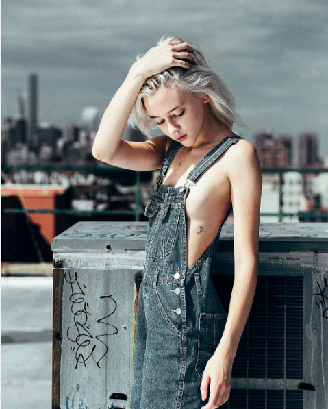 pulling her hair up