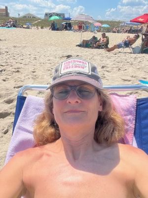 Holly Eggs layin in the sun topless