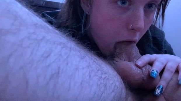 Teen amateur with a nose-ring sucking on cock