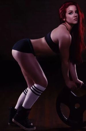 Gorgeous redhead teasing