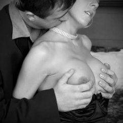 Kiss her neck and fondle her breasts