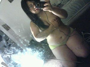 Shy emo covering boobs