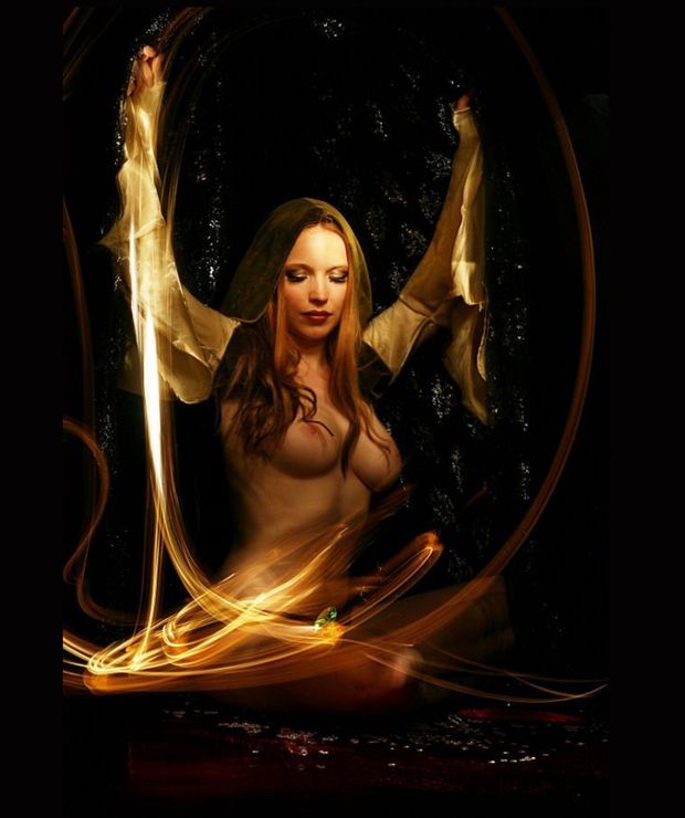 The Illusionist practicing her craft.