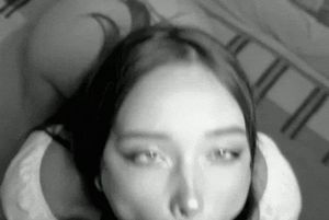 Brunette eyes roll while giving mouth sex