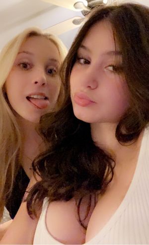 Blonde and brunette big boobs tongue out