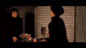 Carla Gugino taking the wire out of her bra