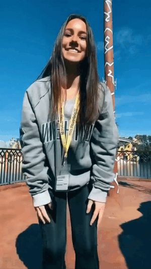 Cute brunette with a big bank