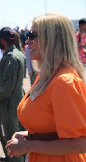 Carol big boobs orange dress
