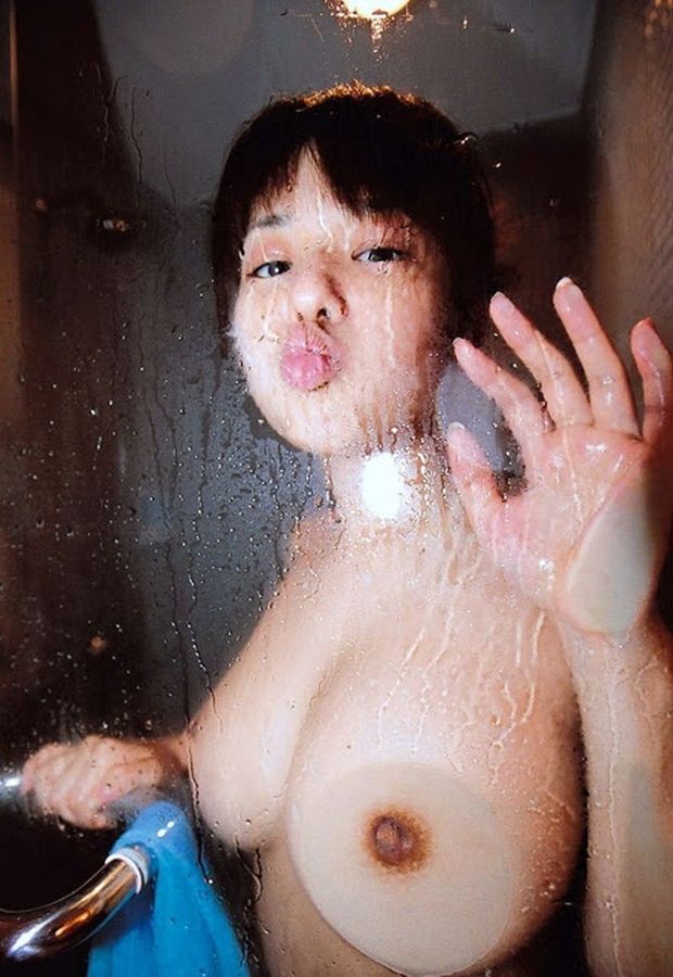 kiss from behind the glass shower door