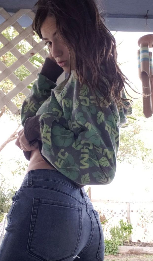 Petite beauty Naomi Dee on the porch 2