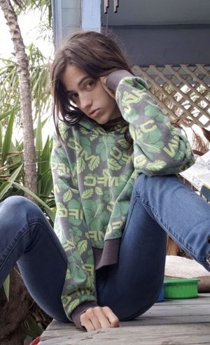 Petite beauty Naomi Dee on the porch 3