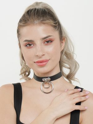 She says it's a "fashion collar", but there's more going on at home