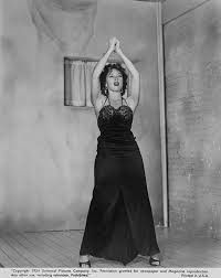 Brunette today-blond tomorrow-only her hairdresser knows.