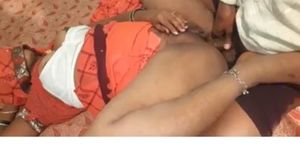 INDIAN-AMATEUR-IN-RED-SARI-DOES ANAL