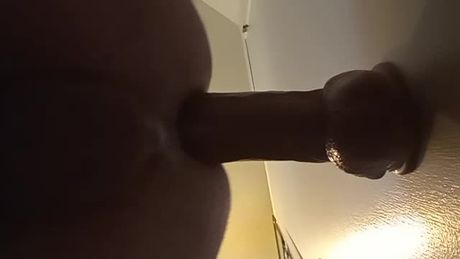 Taking 12 inch dildo in my ass
