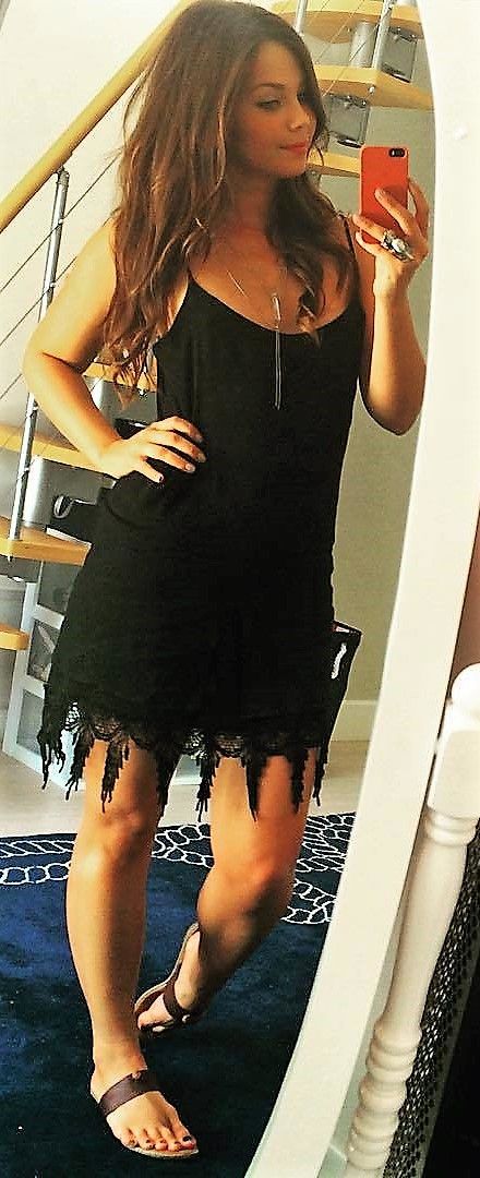 Sexy Heather Sossaman taking selfie pic for her fans in sexy black dress