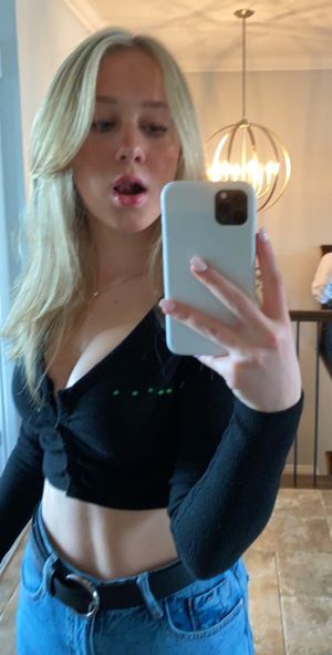 Blonde selfie black top