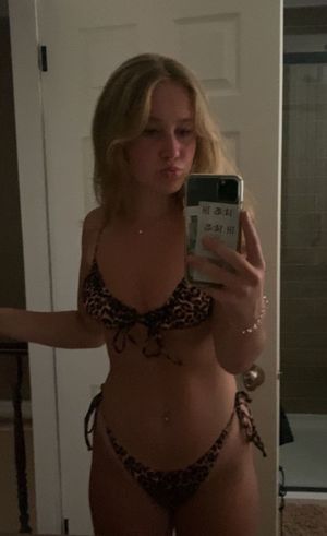 Blonde selfie giraffe print bikini