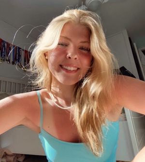 Molly tan lines blue top