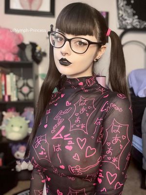 Sexy emogirl with pigtails and see-through shirt