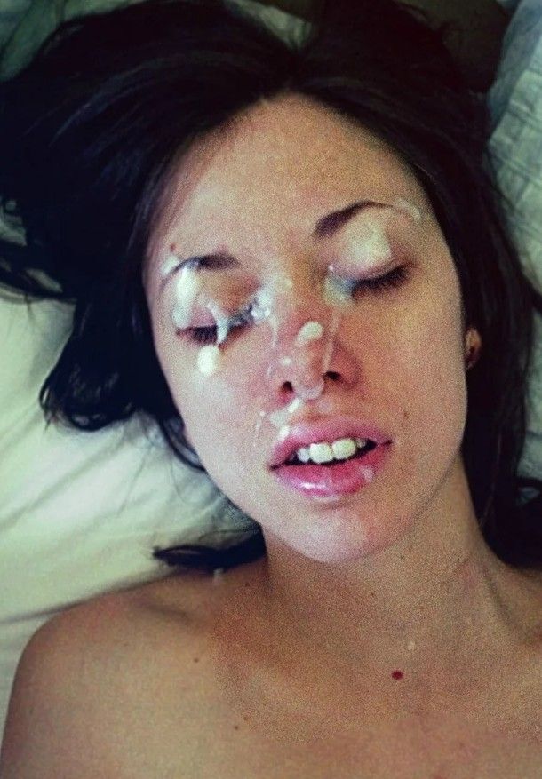 Amateur brunette teen with her face covered in cum