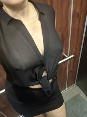 Cute brunette in elevator