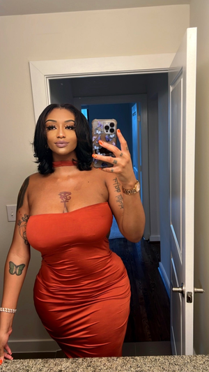 Sophia Ifeoma in a dress