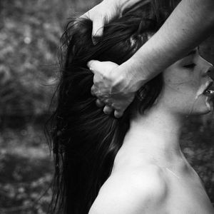 Covering her lips in cum