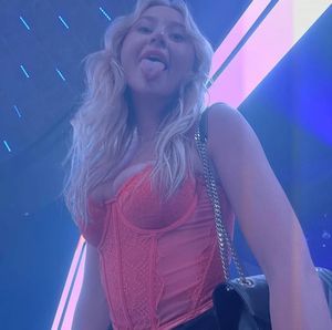 Claire tongue out bustier