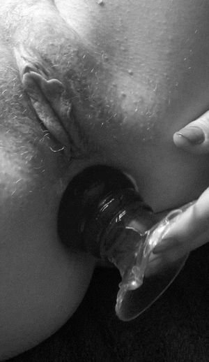 Girlfriend playing with her loosened asshole filling it with a large plug