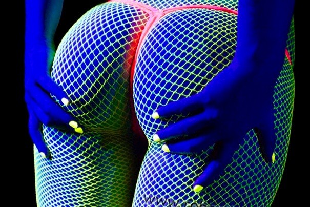 Hot after dark neon fishnet stockings and g-string.