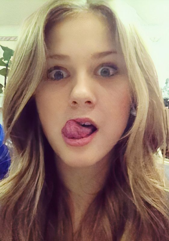 Gorgeous Chick Teasing With Her Tongue