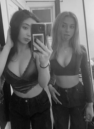 Blonde & brunette mirror selfie tongue