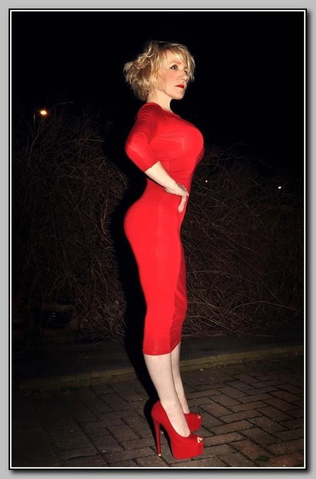 Curvy blonde in red dress and peeptoe platform heels