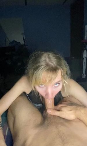 Amateur blond looking up and sucking on cock